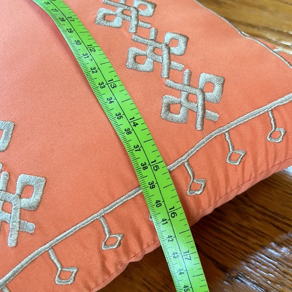 Jessica Simpson accent pillow.  Orange w/tan embroidery on one side.  12”x16.5”